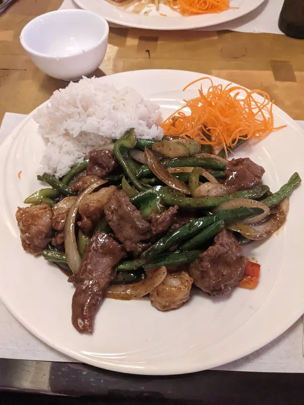 A freshly prepared dish at Concerto Fusion Cuisine