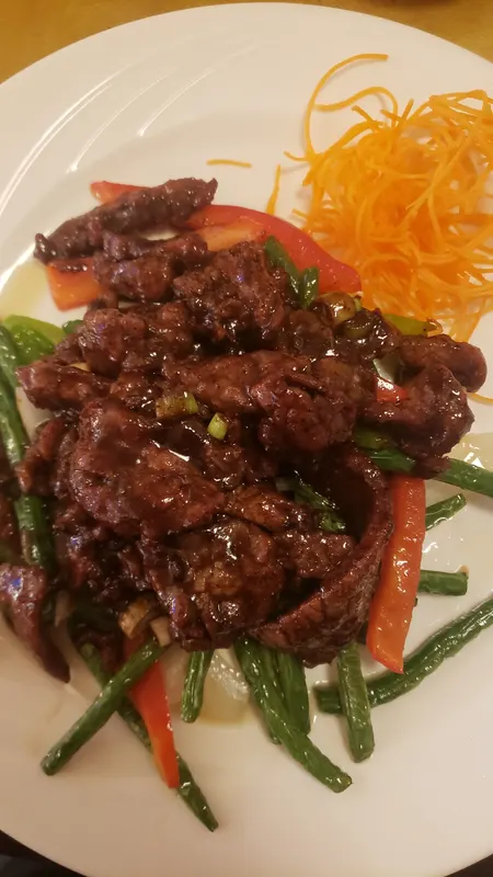 A freshly prepared dish at Concerto Fusion Cuisine