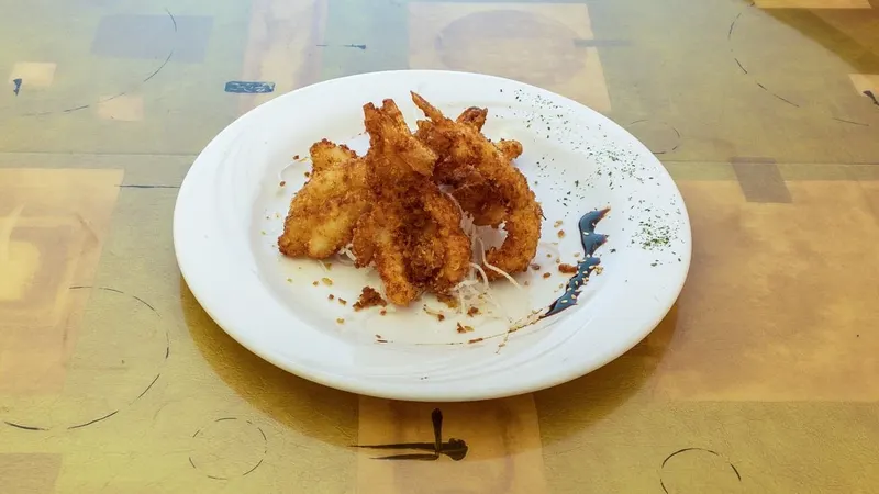 A freshly prepared dish at Concerto Fusion Cuisine